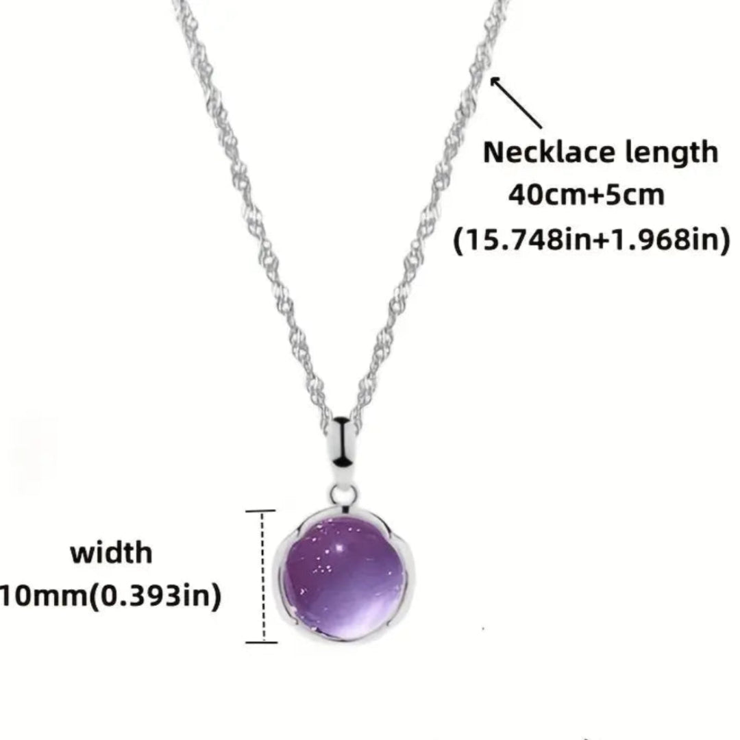 Simple yet elegant fashion jewelry: a silver-plated zinc alloy pendant necklace with a purple crystal, perfect for Mardi Gras or everyday style.