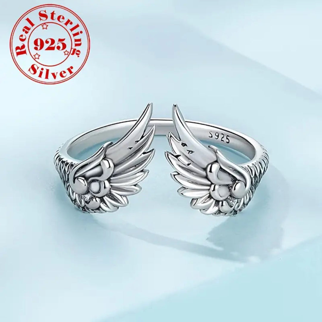  A stylish silver-plated open ring with delicate carvings and a trendy wing design, perfect for daily outfits or party accessories.